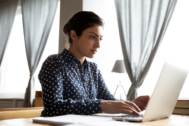 Business woman working on laptop